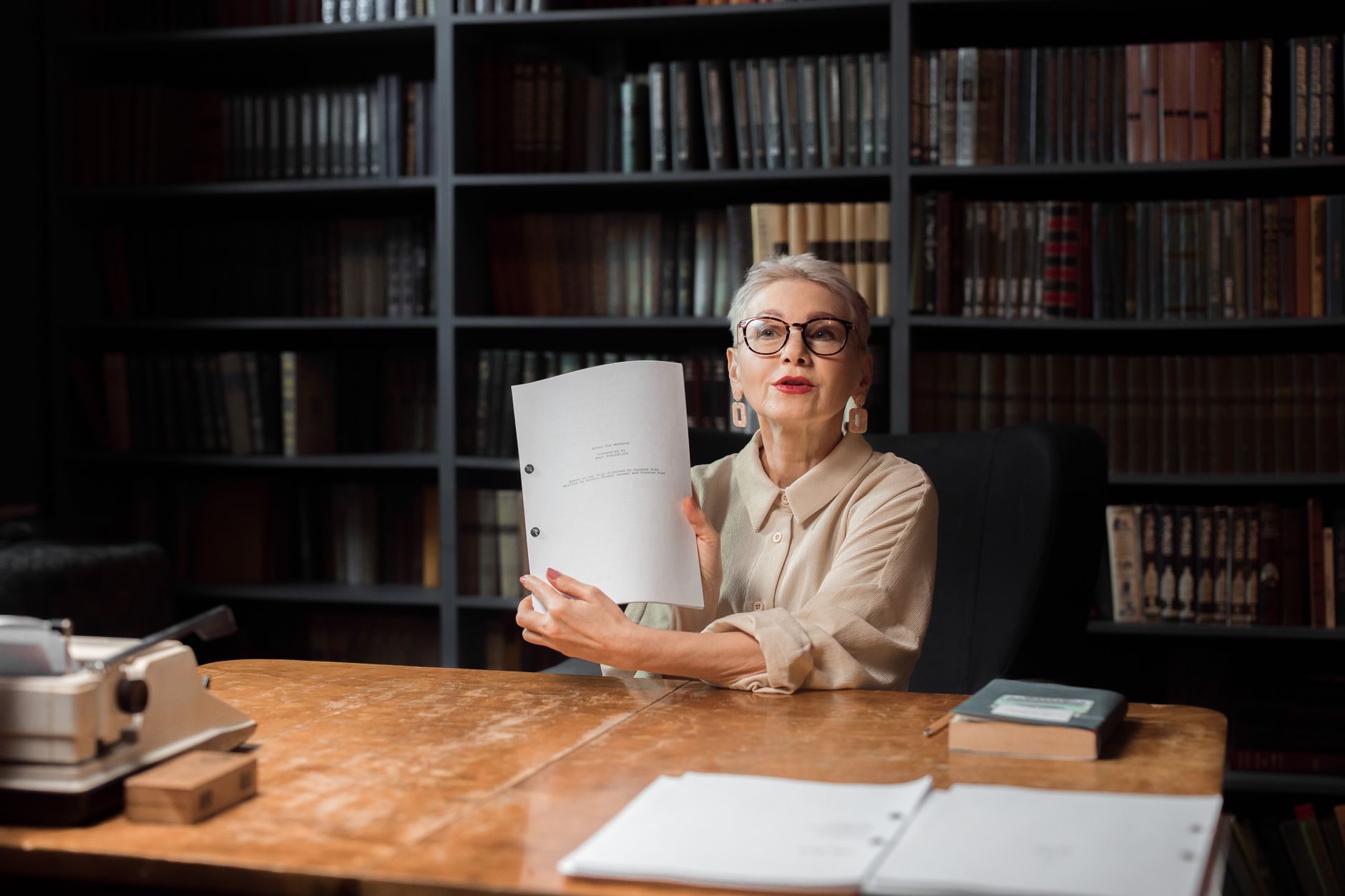 Academic Research, Research Assistant, For Literature Review, Paper Writing Hel — Senior woman with manuscript at a wooden desk in a librar