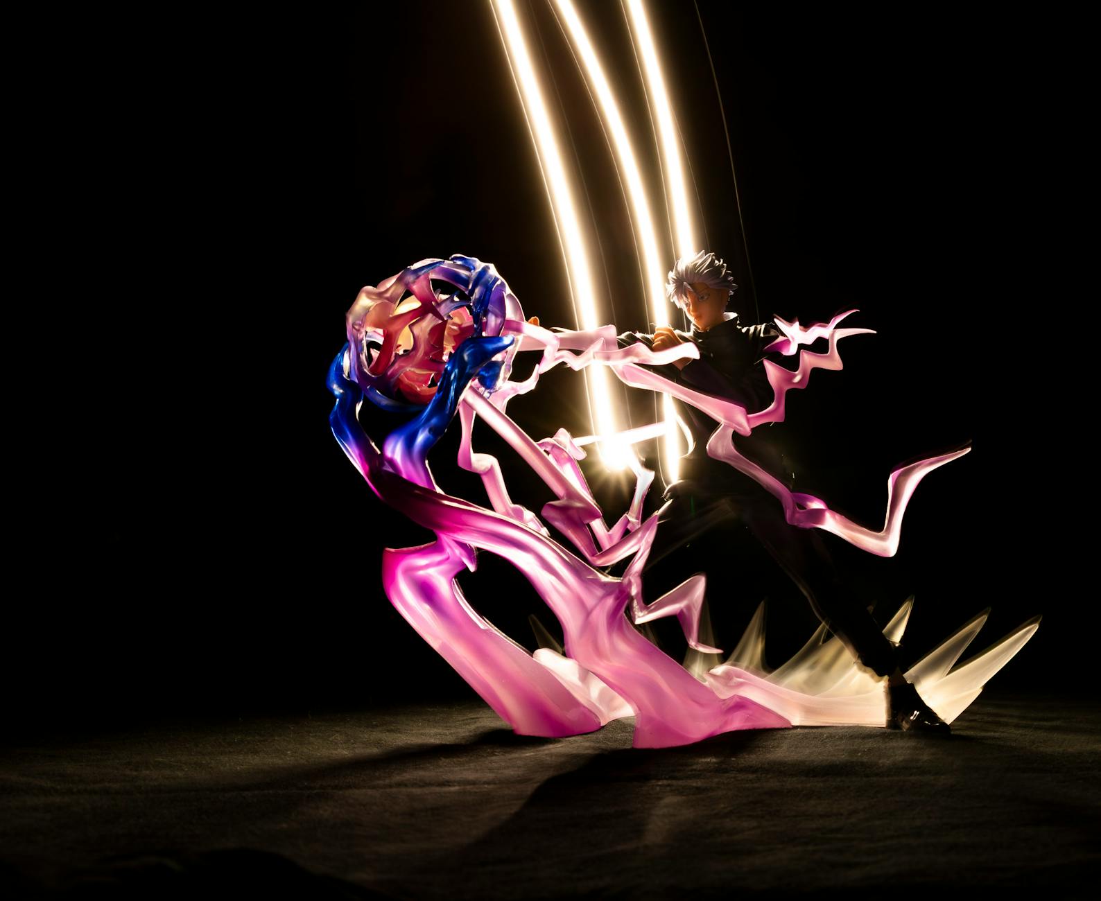 Action Figure — Vibrant abstract art with light trails surrounding a dynamic figurine in motion.