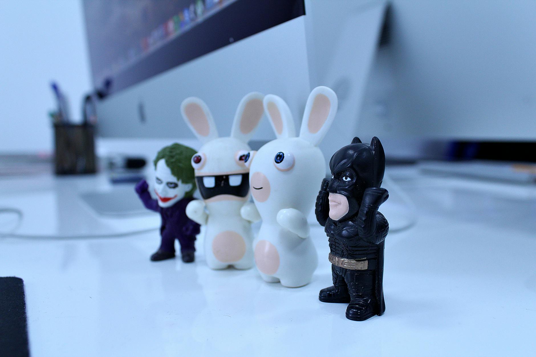 Action Figure,Action Figure,Custom Action Figure, Toy Figure,Create Action F — Close-up of various cartoon figurines on a modern desk se