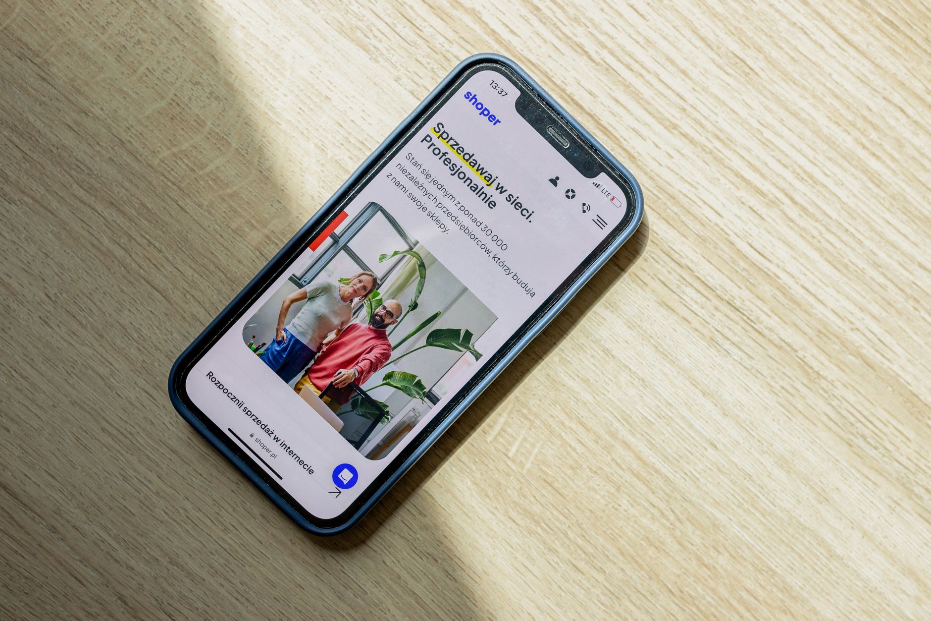 App Builder, Website, V0 Alternative, Bolt Alternative, Lovable Alternative, Co — Smartphone displaying an ecommerce website. Optimize onli