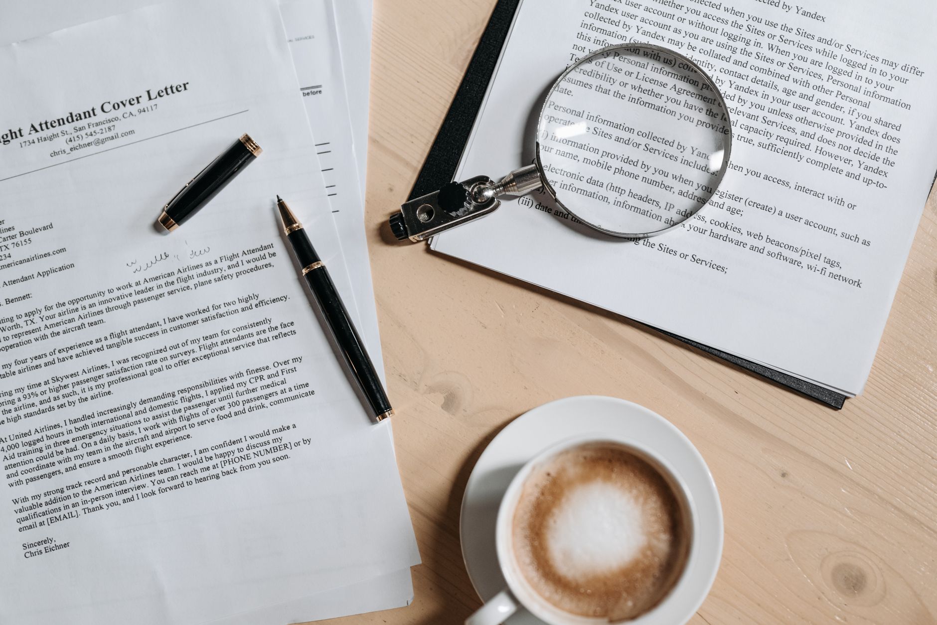 Cover Letter, Cover Letter Writer, Job Application Letter, Cover Letter — A top view of coffee and job application documents with a magni