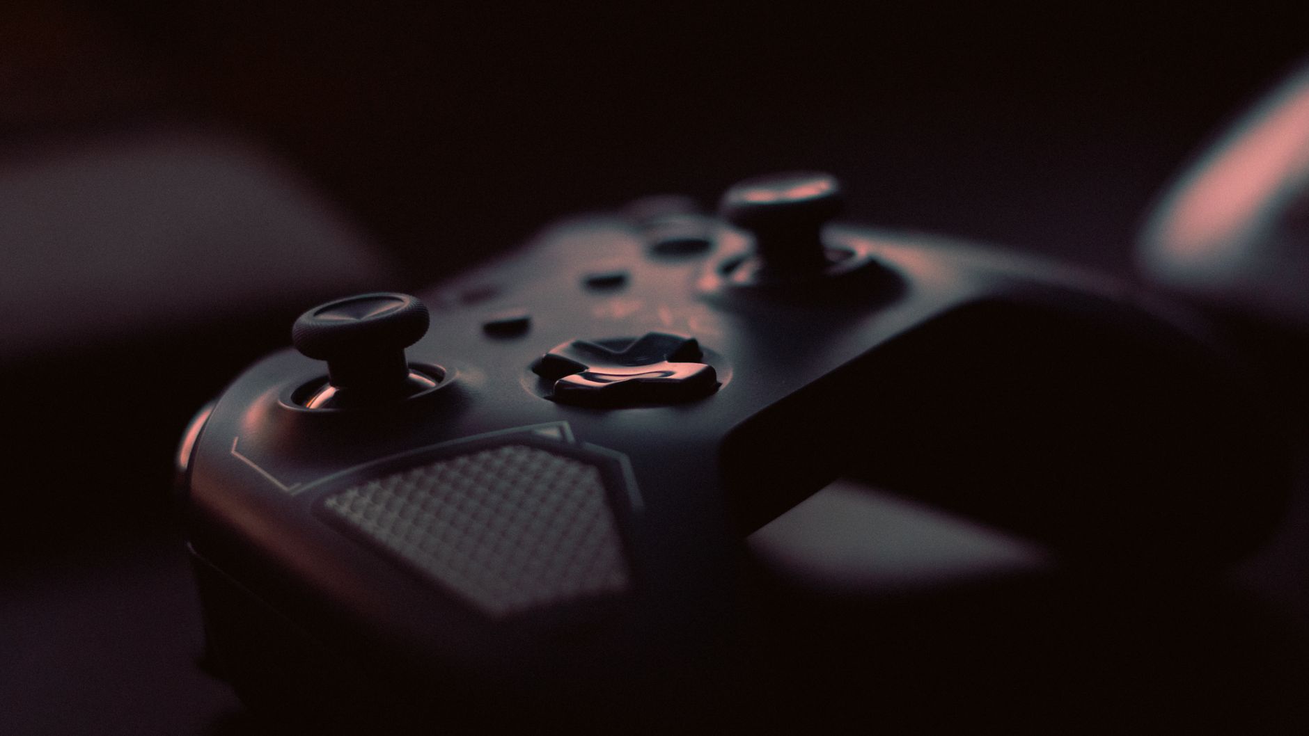 For Games, For Gaming, For Video Games, Artificial Intelligence For Games, For G — A close-up shot of a game controller in low light, highli