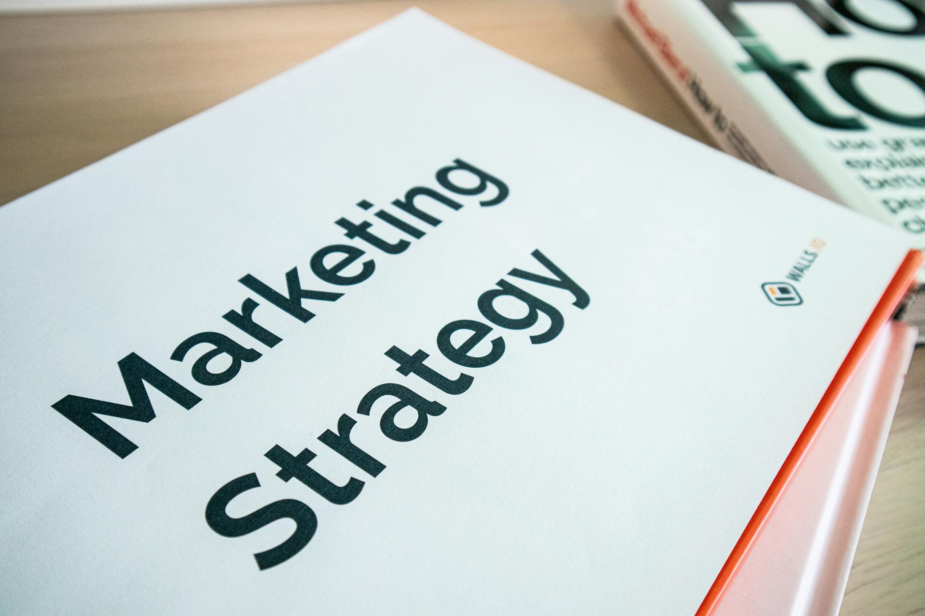 For Marketing, Marketing Assistant, For Marketers — Close-up of a marketing strategy document on a desk, ideal for business content.