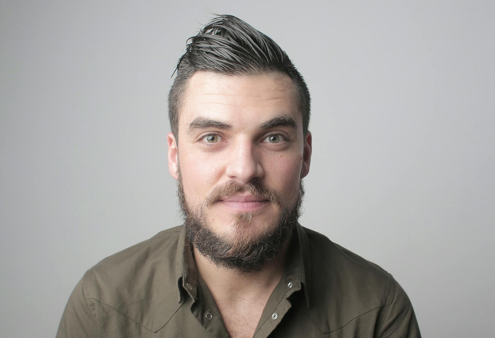 Headshot, Professional Headshot, Headshots, Business Headshot, Linkedin Heads — Close-up portrait of a man with a beard and styled hair, 