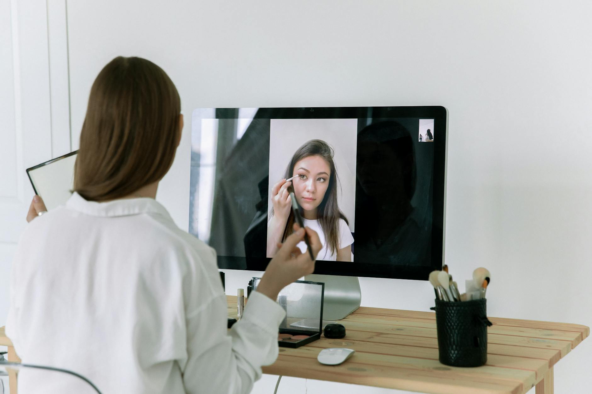 Makeup, Virtual Makeup Try On, Beauty Filter, Virtual Makeover Online, Cosmetic — Woman following an online beauty tutorial, applying makeu