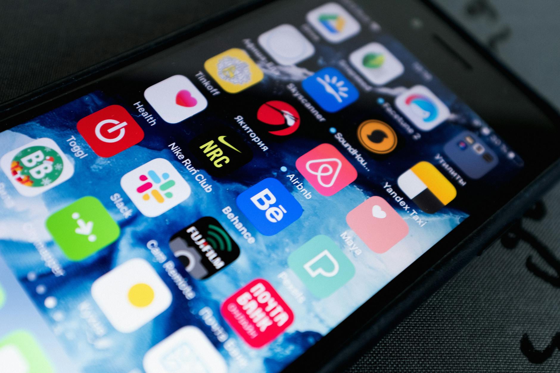 Mobile App Builder, React Native, Rork Alternative, Expo App Builder, App, Mob — Detailed view of smartphone displaying multiple app icons