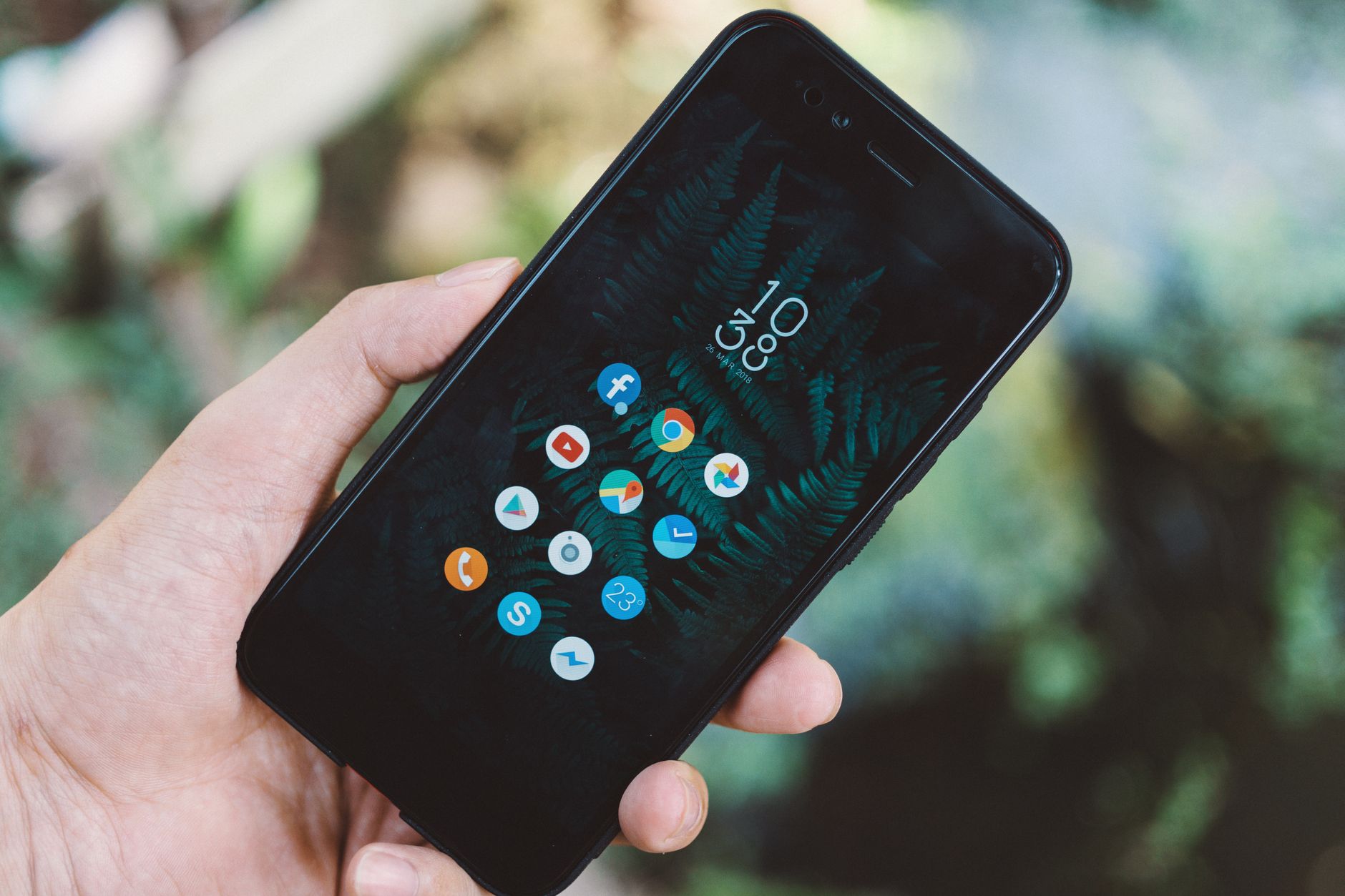 Mobile App Builder, React Native, Rork Alternative, Expo App Builder, App, Mob — Close-up of a hand holding a smartphone with app icons an