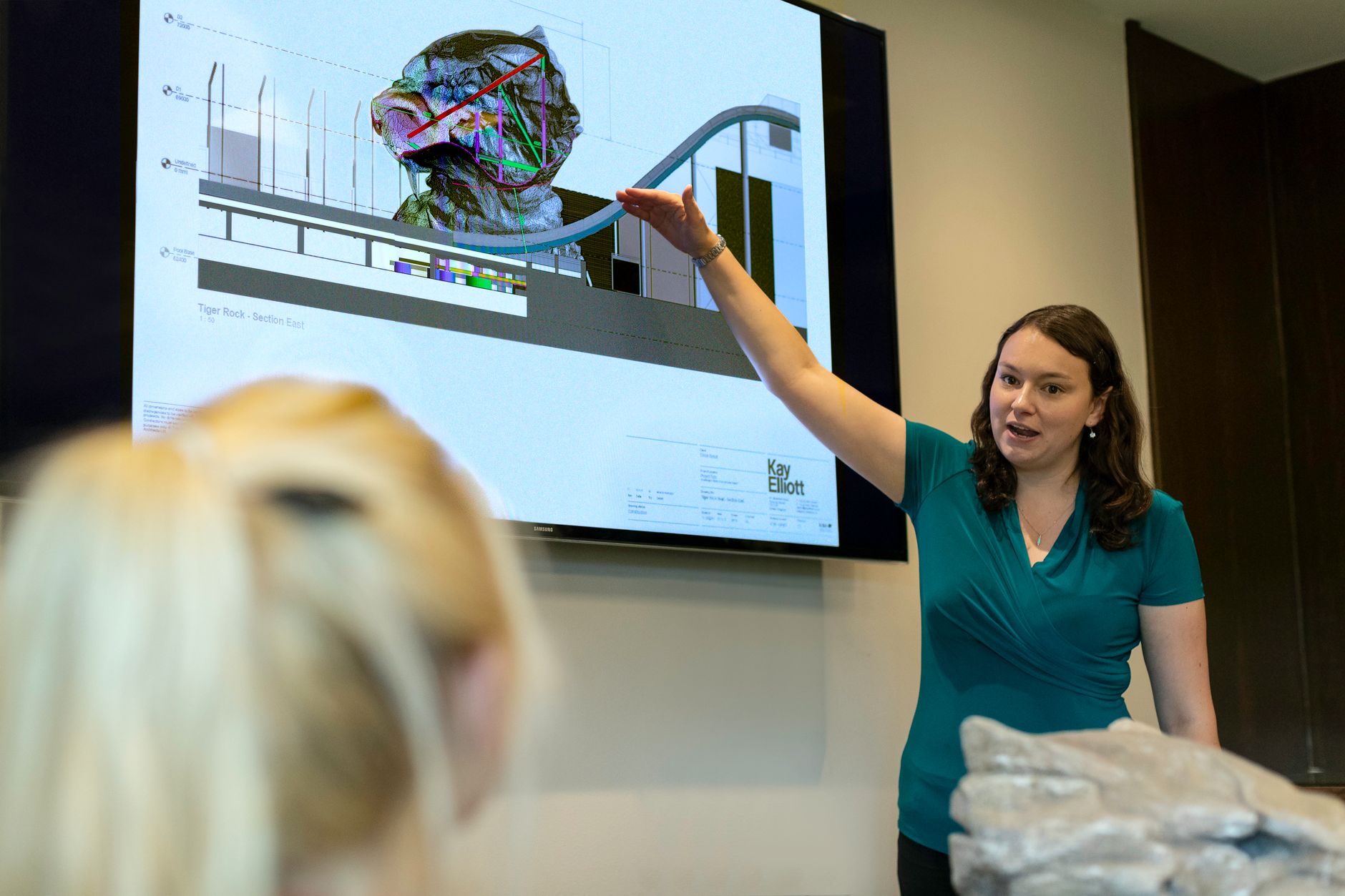PowerPoint Presentation, Best For PowerPoint Slides, Presentation, -Powered Sl — A female engineer delivers a presentation on rollercoaste