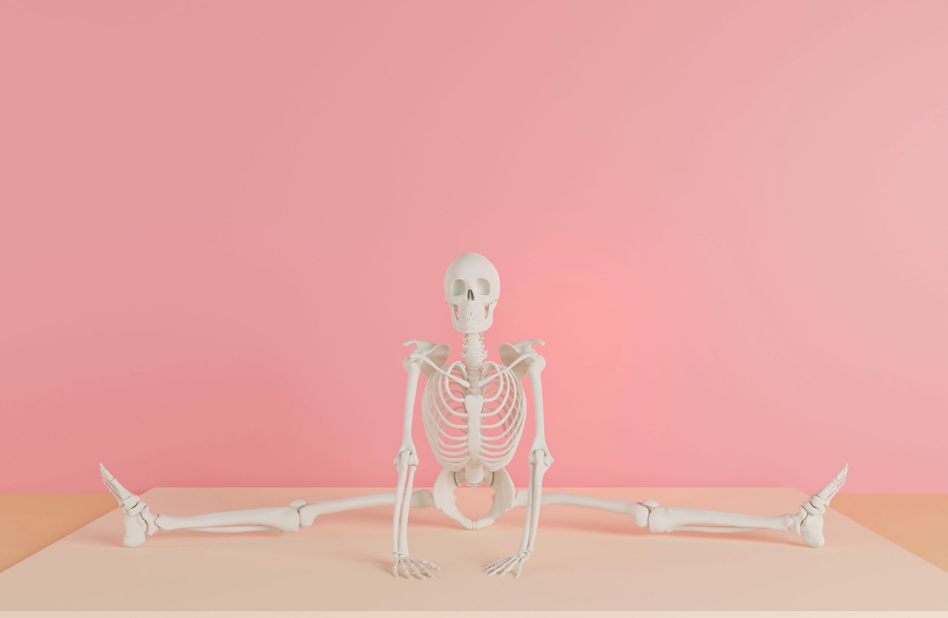 Skeleton Video,Skeleton Video, Skeleton Animation,Skeleton Tiktok Video,Skelet — A human skeleton model does a split against a pink backdr