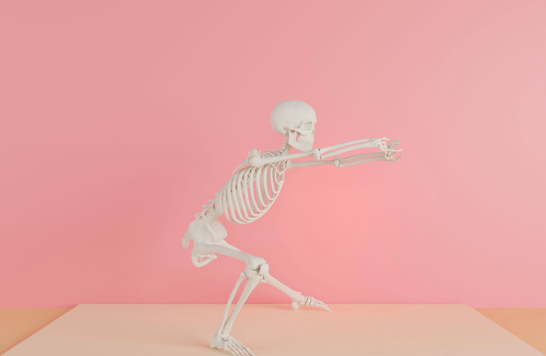 Skeleton Video,Skeleton Video, Skeleton Animation,Skeleton Tiktok Video,Skelet — A human skeleton model posed creatively against a pink ba