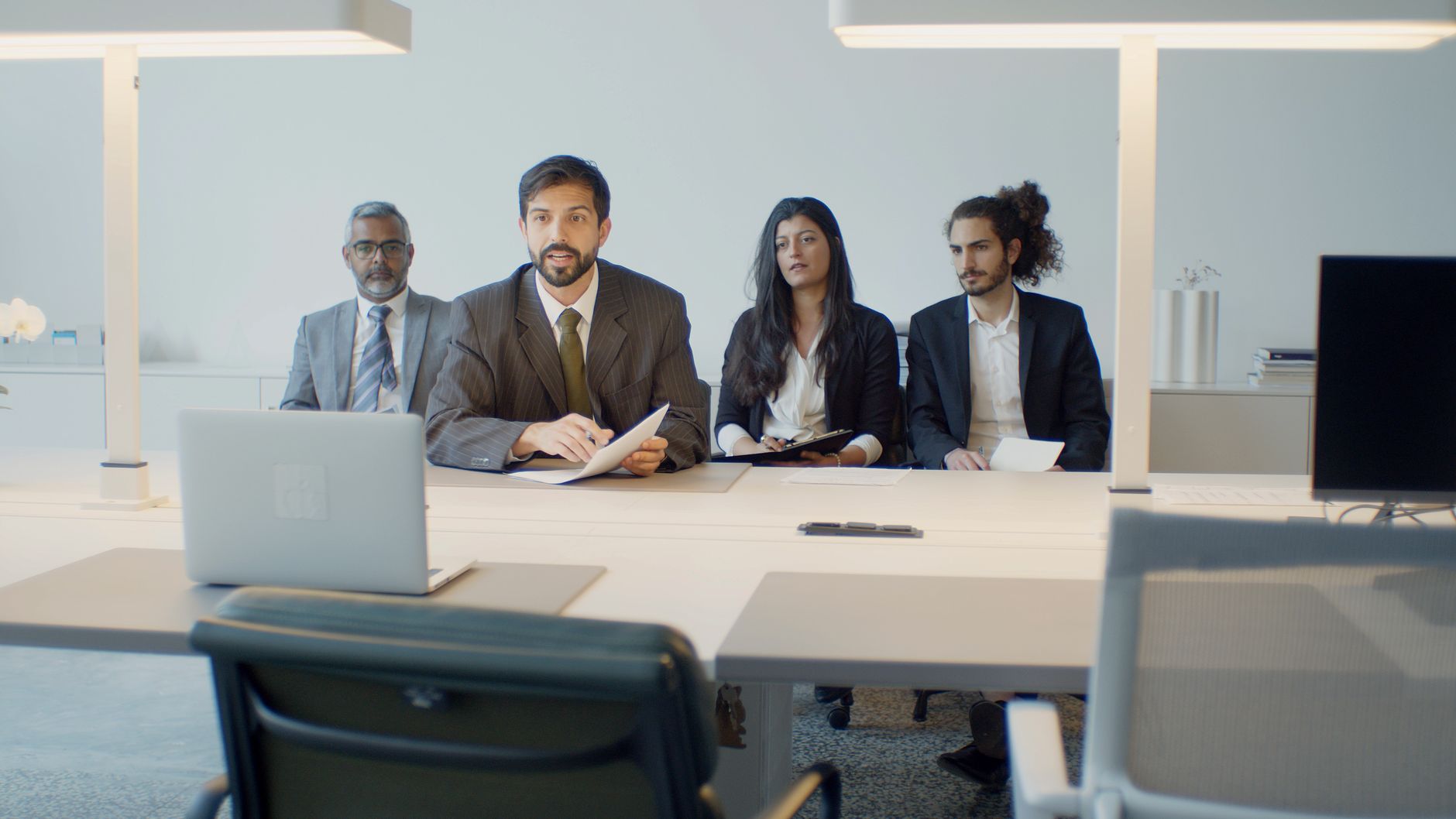 Talking Avatar, Video Avatar, Text To Video With Avatar, Presenter, Spokesperson — A diverse team in a business meeting using video conferen