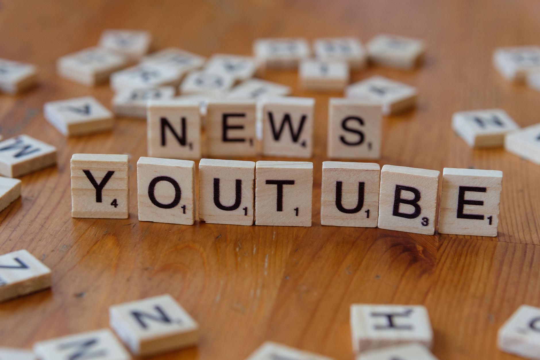 Video Creation, Video, Video Creation, Create Video With, Video, Text To Vi — Scrabble tiles spelling words on wooden surface, focusing