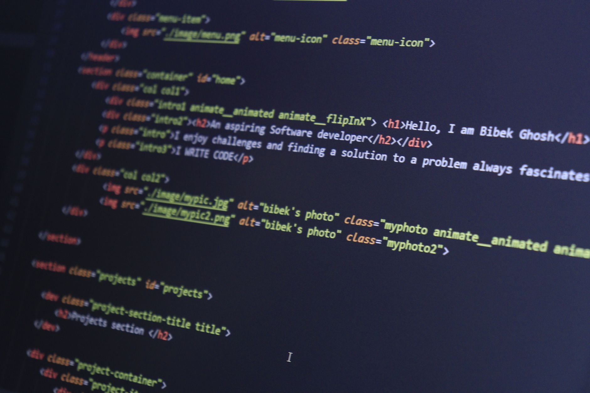 Web Development, Website Builder, Build Website With, Coding Assistant For Web — Colorful HTML code displayed on a computer screen for pro
