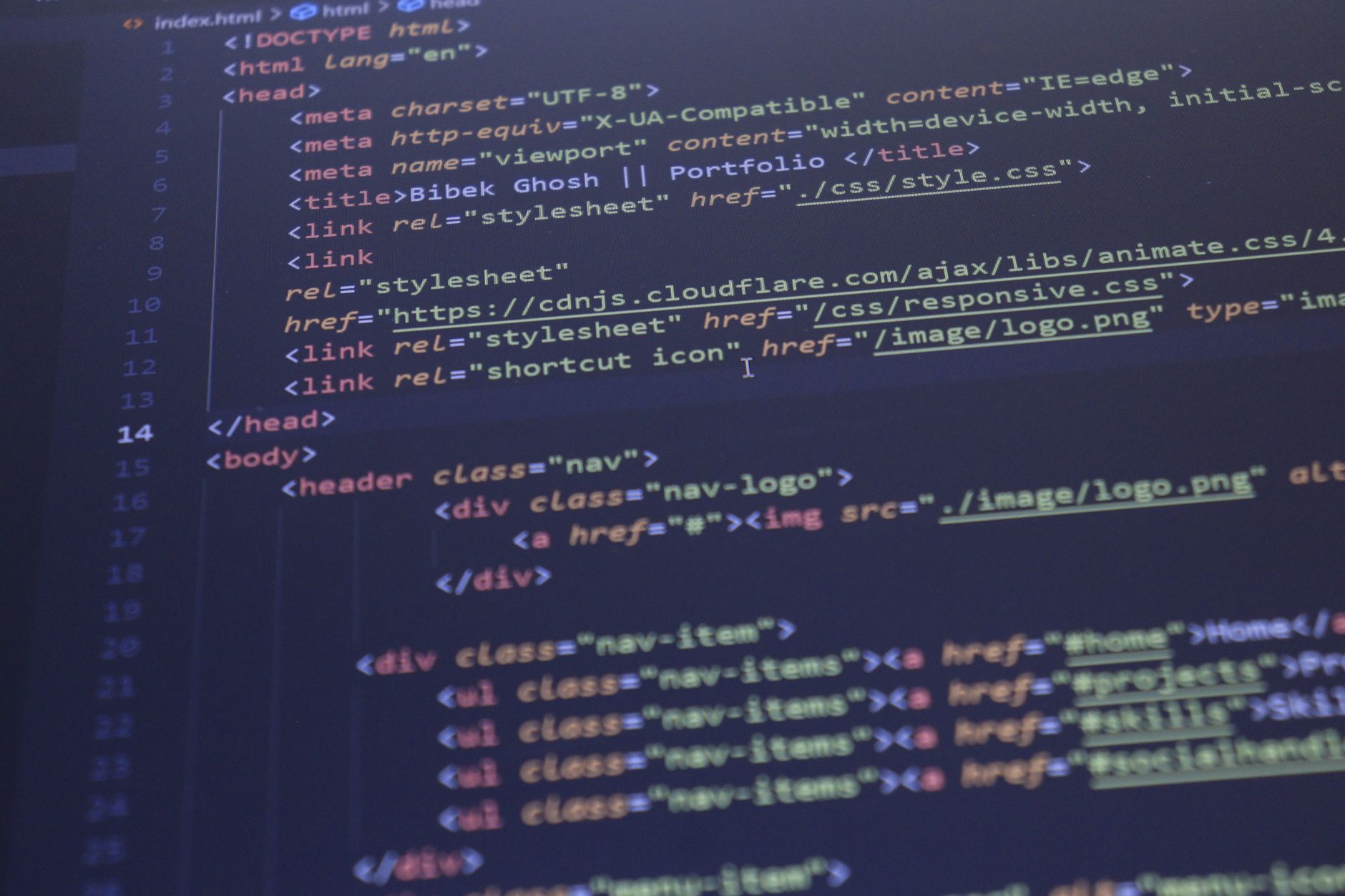 Web Development, Website Builder, Build Website With, Coding Assistant For Web — Close-up view of HTML and CSS code displayed on a compute