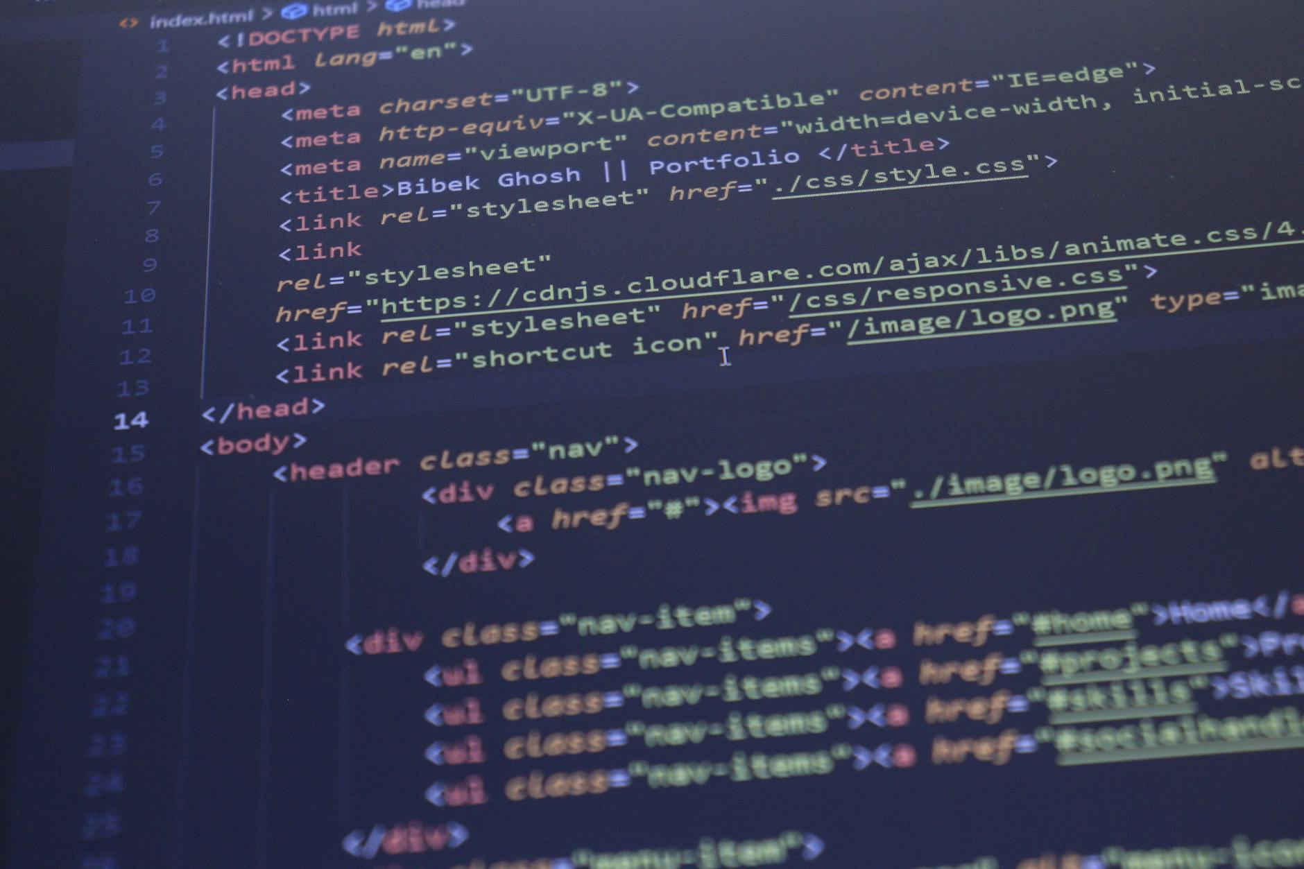 Website Builder, Website, Site Builder, Text To Website, Web Design — Close-up view of HTML and CSS code displayed on a computer screen, id