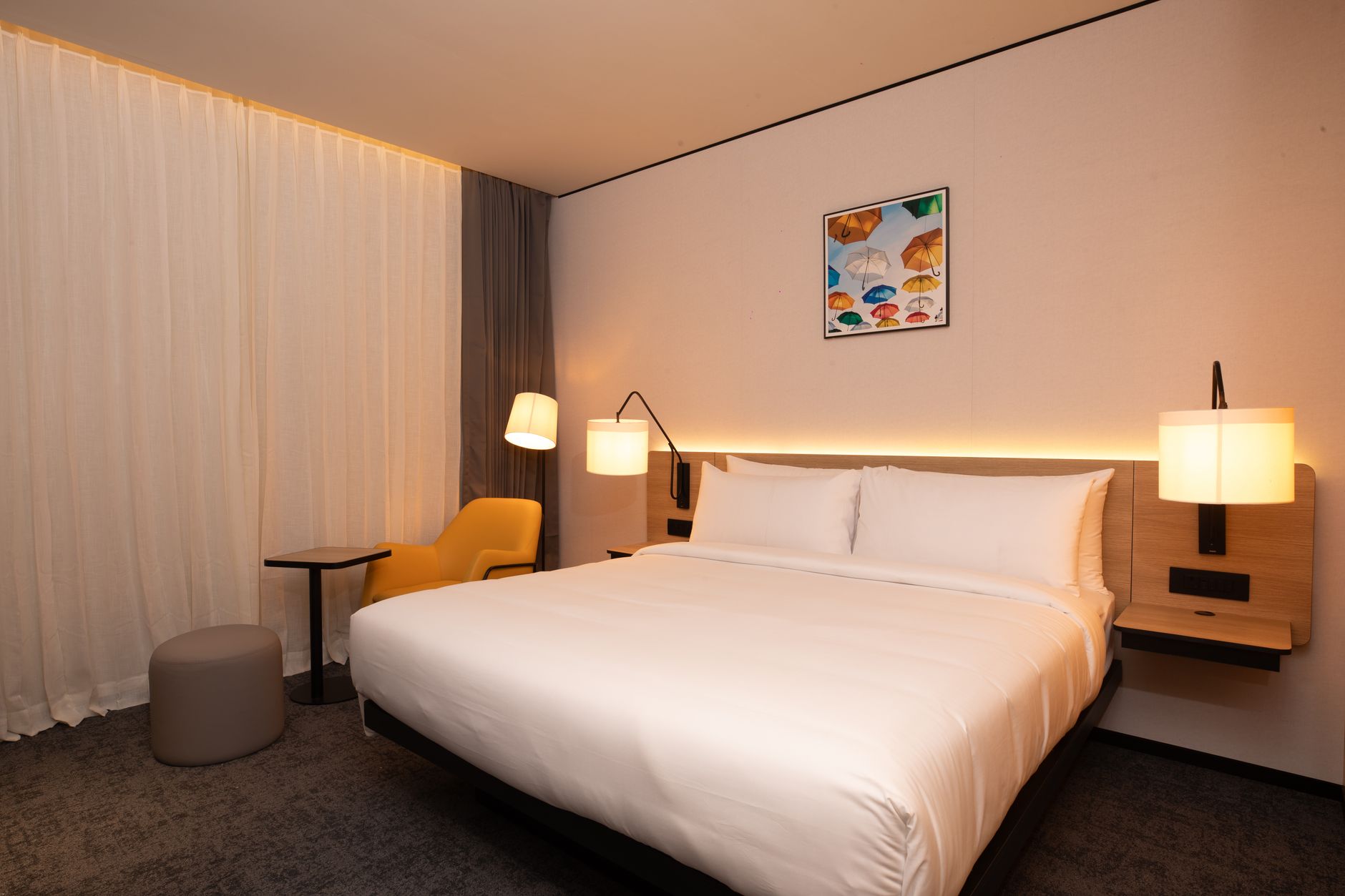 Best For Interior Design — Stylish and cozy modern bedroom with elegant lighting and minimalist decor.