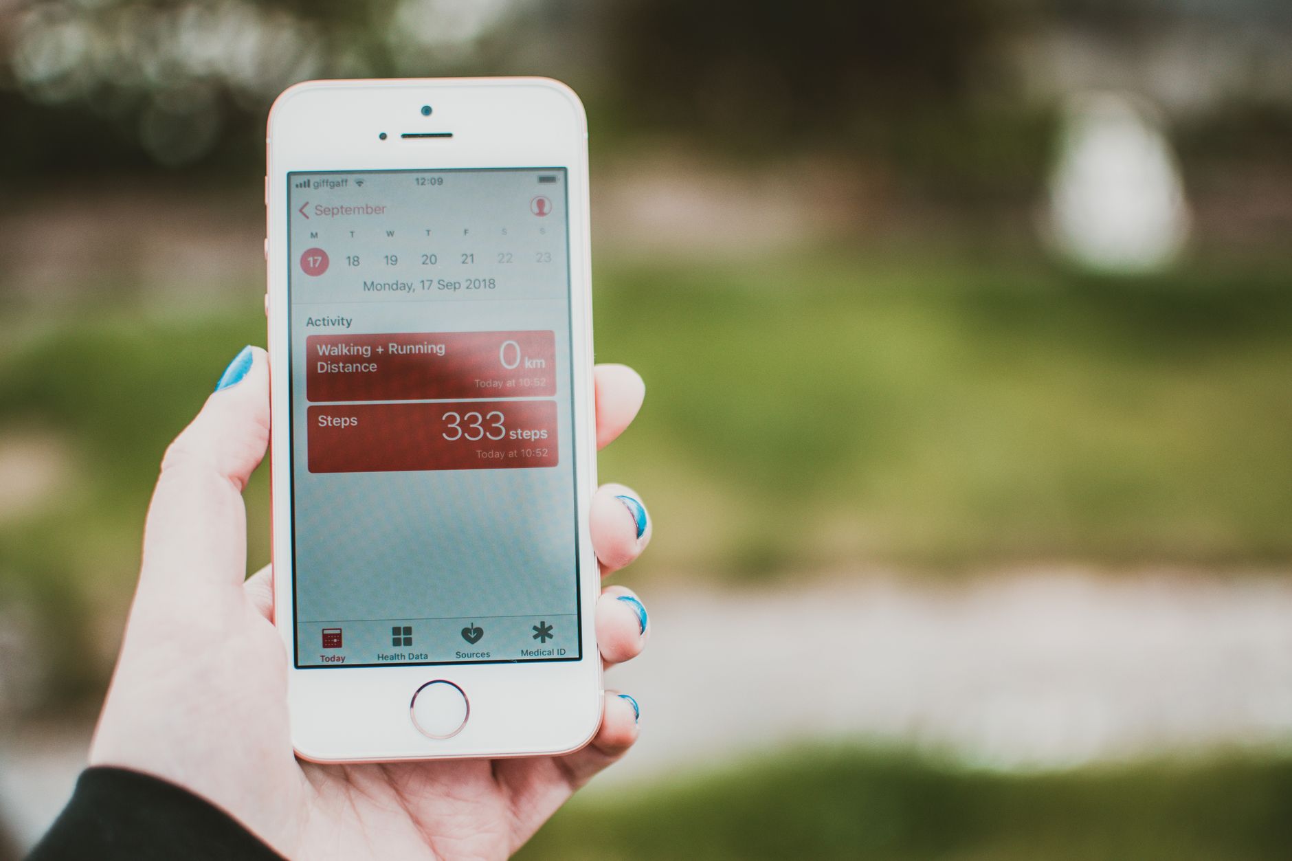 Habit Tracker App, Best Habit Tracker, Habit Tracker, Daily Habit Tracker, Habit — A person holds a smartphone showing a fitness app with st